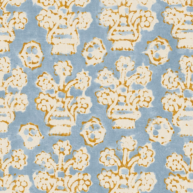 Powder blue fabric with ivory floral urns and ochre botanical outlines