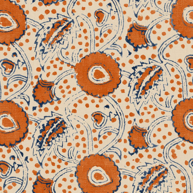 Warm terracotta, cream and navy paisley florals on a textured linen ground