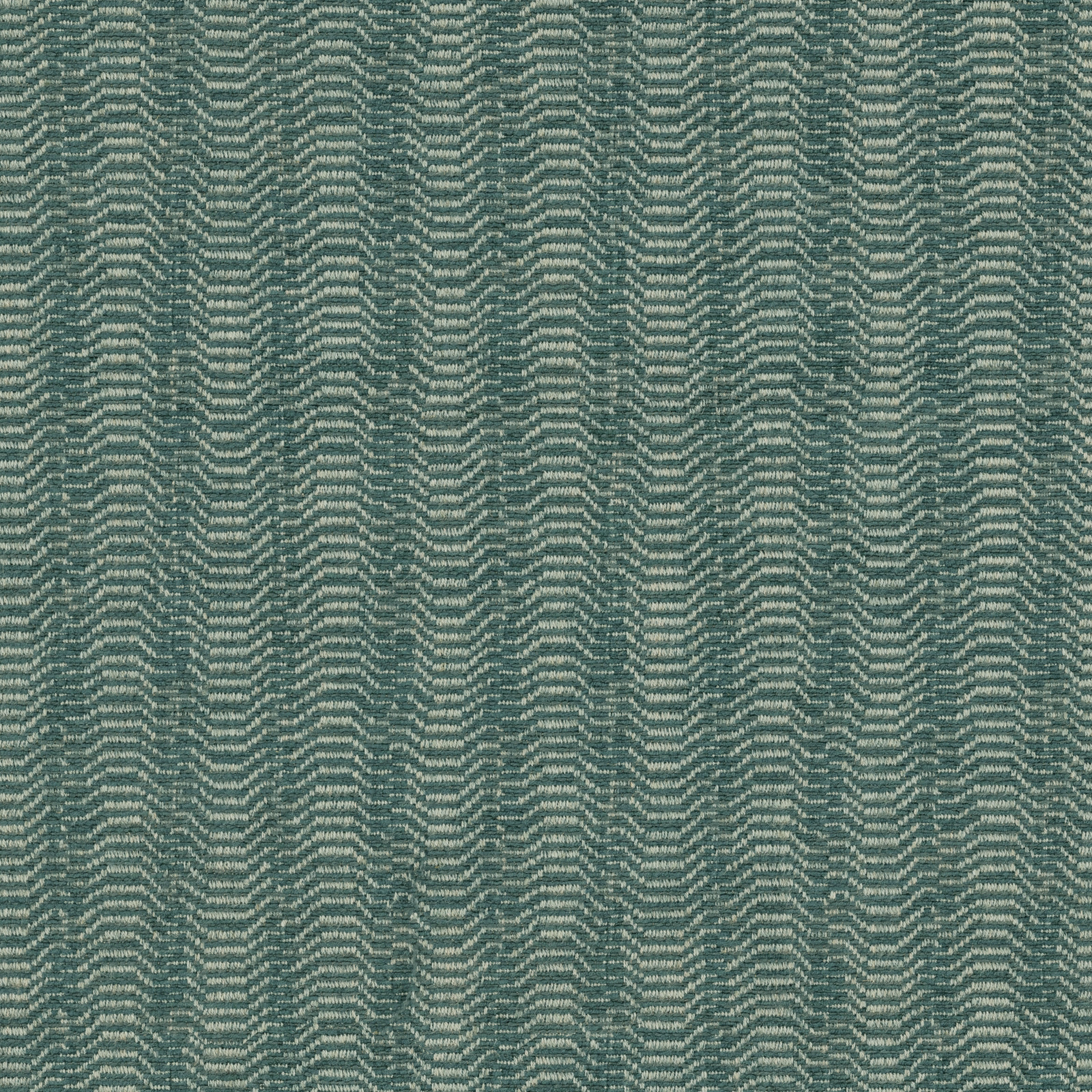 Close-up of a muted sea green woven fabric with chevron texture