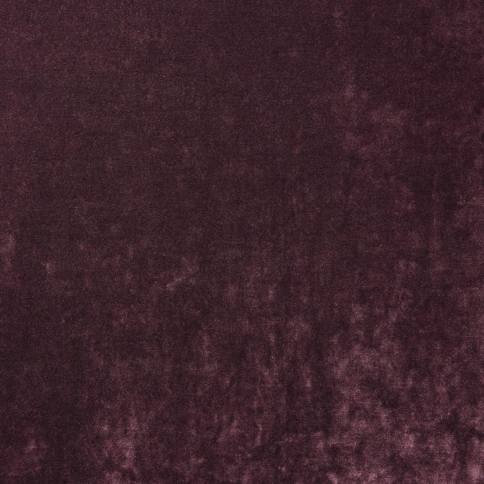 Deep berry-burgundy velvet with plush nap and softly mottled tonal highlights