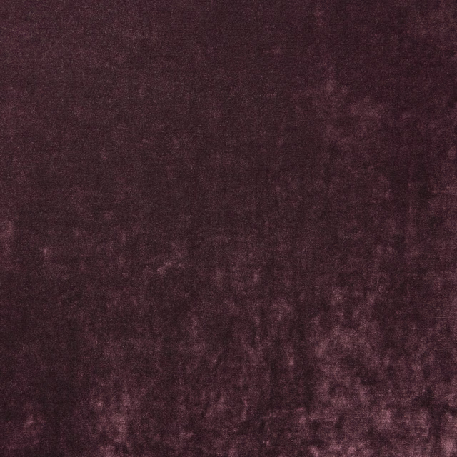 Deep berry-burgundy velvet with plush nap and softly mottled tonal highlights