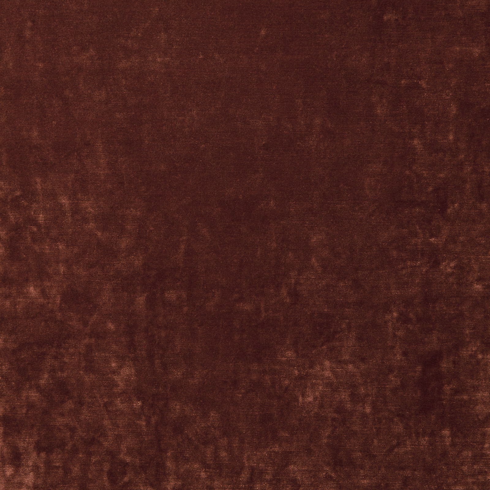 Deep currant-brown velvet with mottled pile and softly catching light