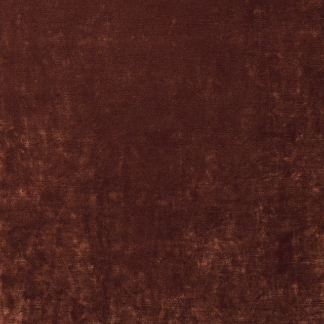 Deep currant-brown velvet with mottled pile and softly catching light