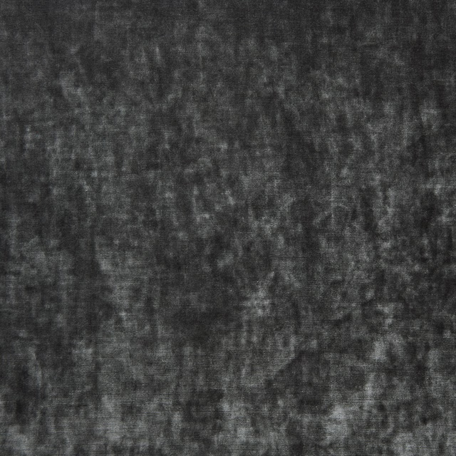 Mottled charcoal-black velvet with smoky grey nap and softly shifting texture