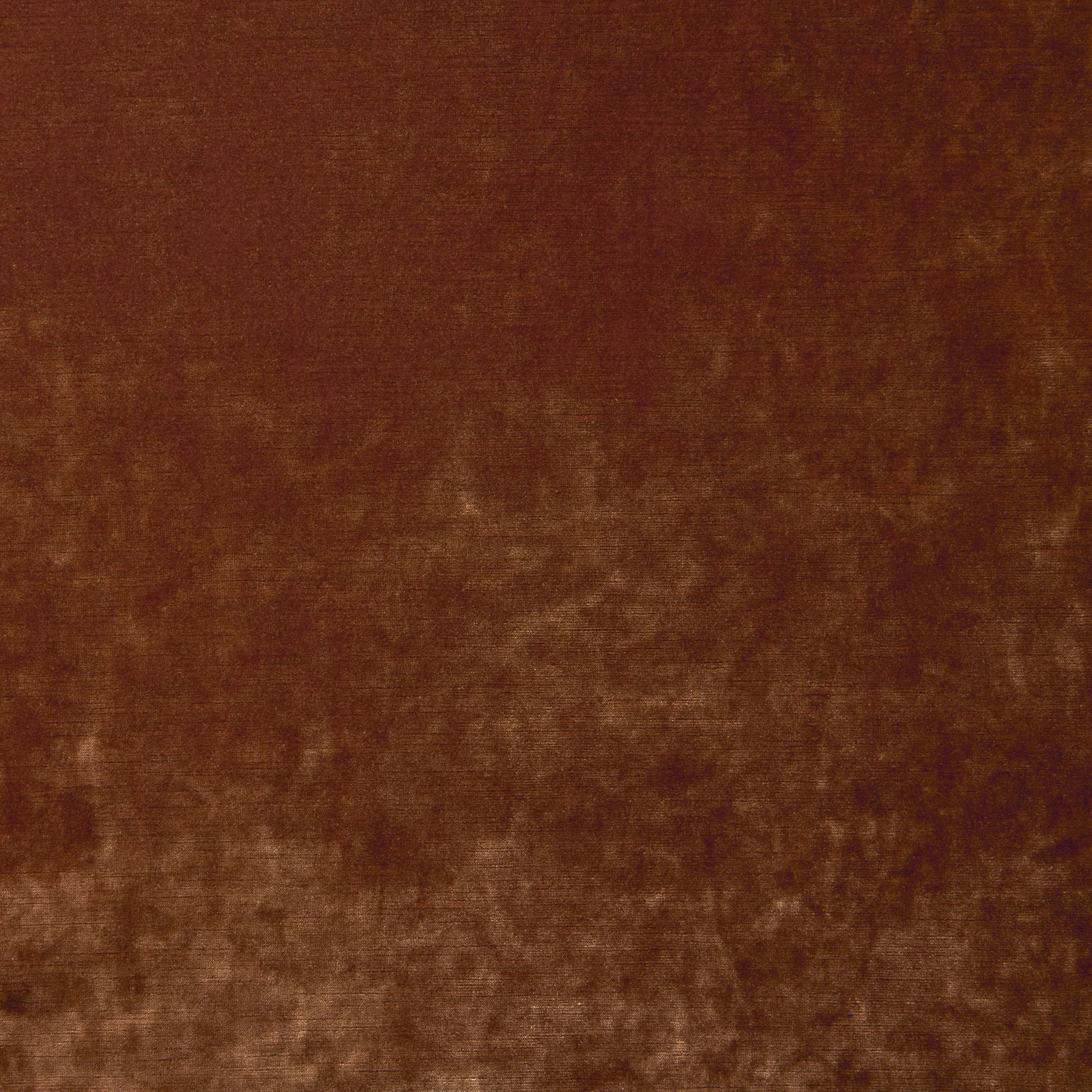 Warm brick-red velvet with smoky brown mottling and directional light-catching pile