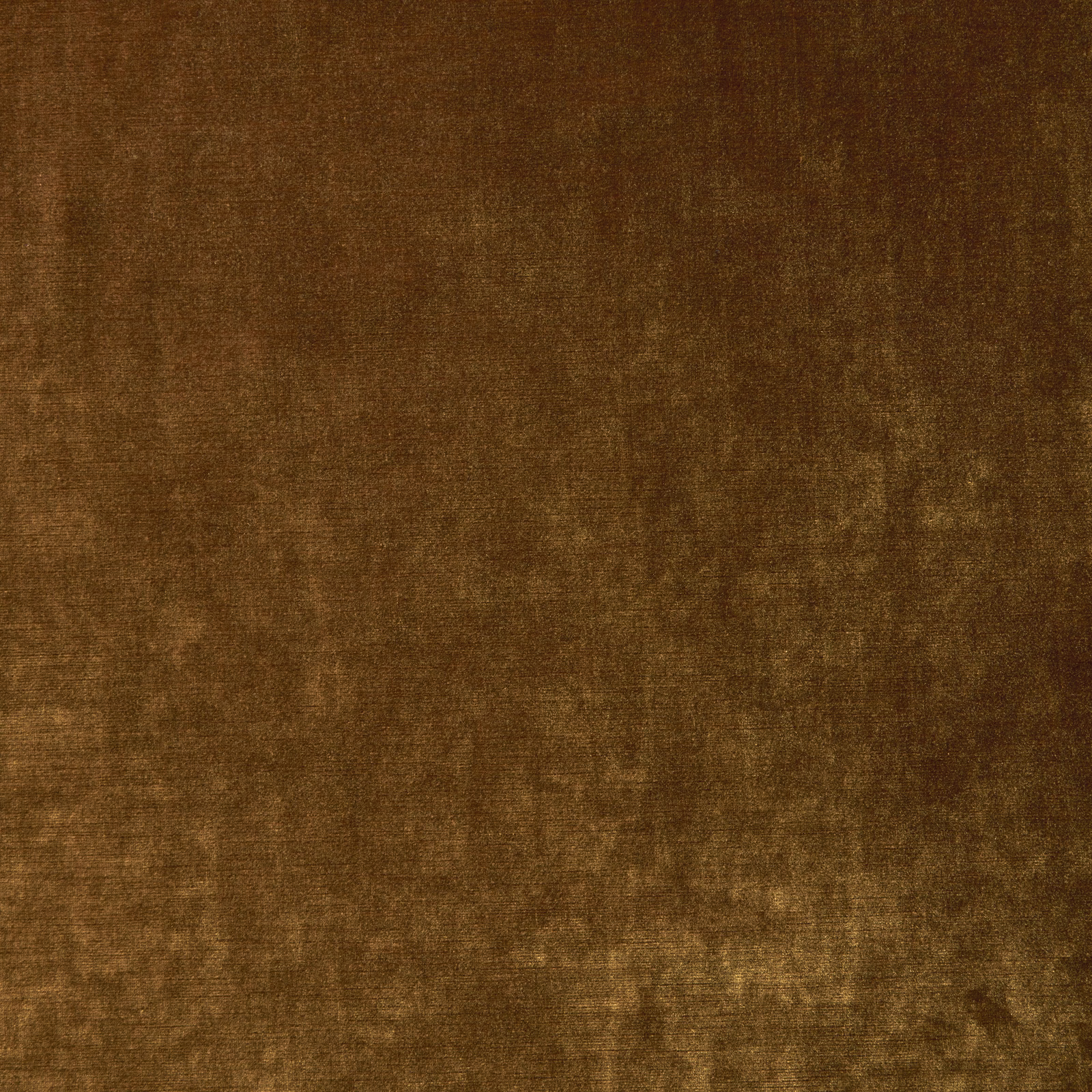 Mottled spice-brown velvet with warm terracotta and amber tonal variation