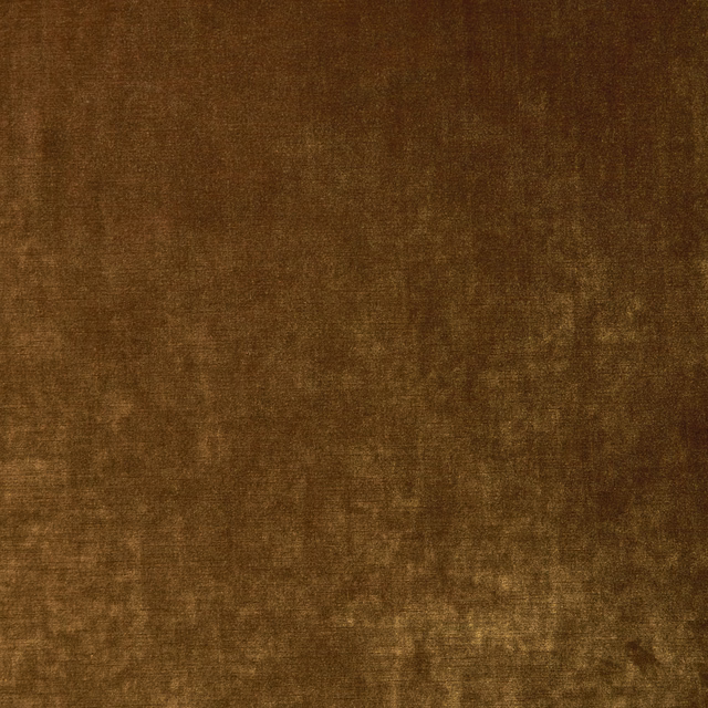 Mottled spice-brown velvet with warm terracotta and amber tonal variation