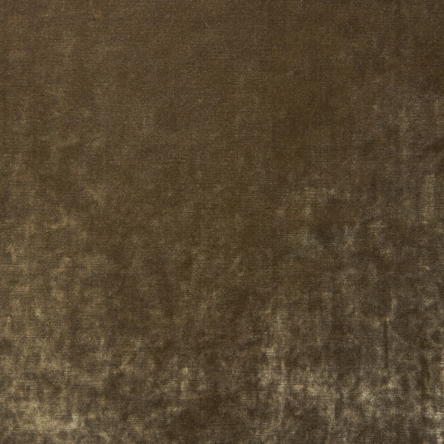 Tawny brown velvet close-up with softly mottled, light-catching nap