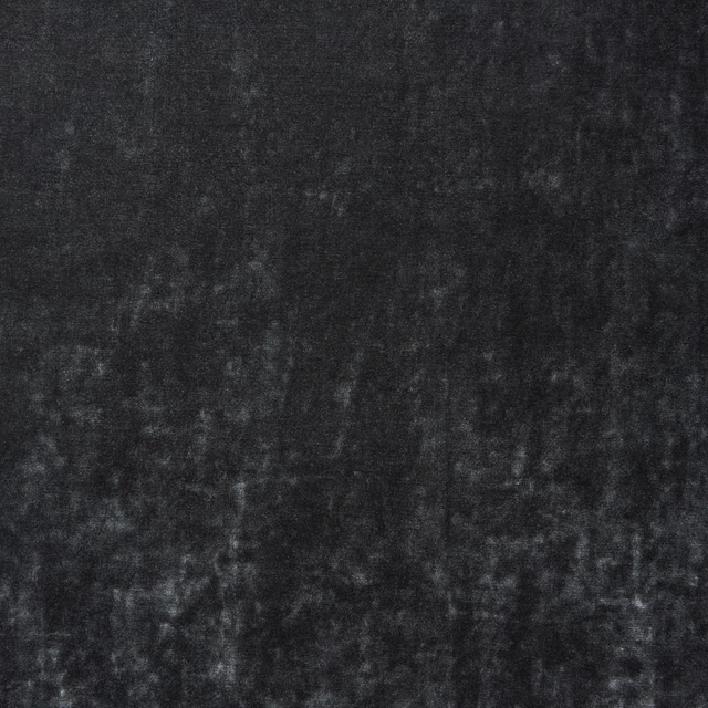 Near-black charcoal velvet with smoky grey nap variations across its plain surface