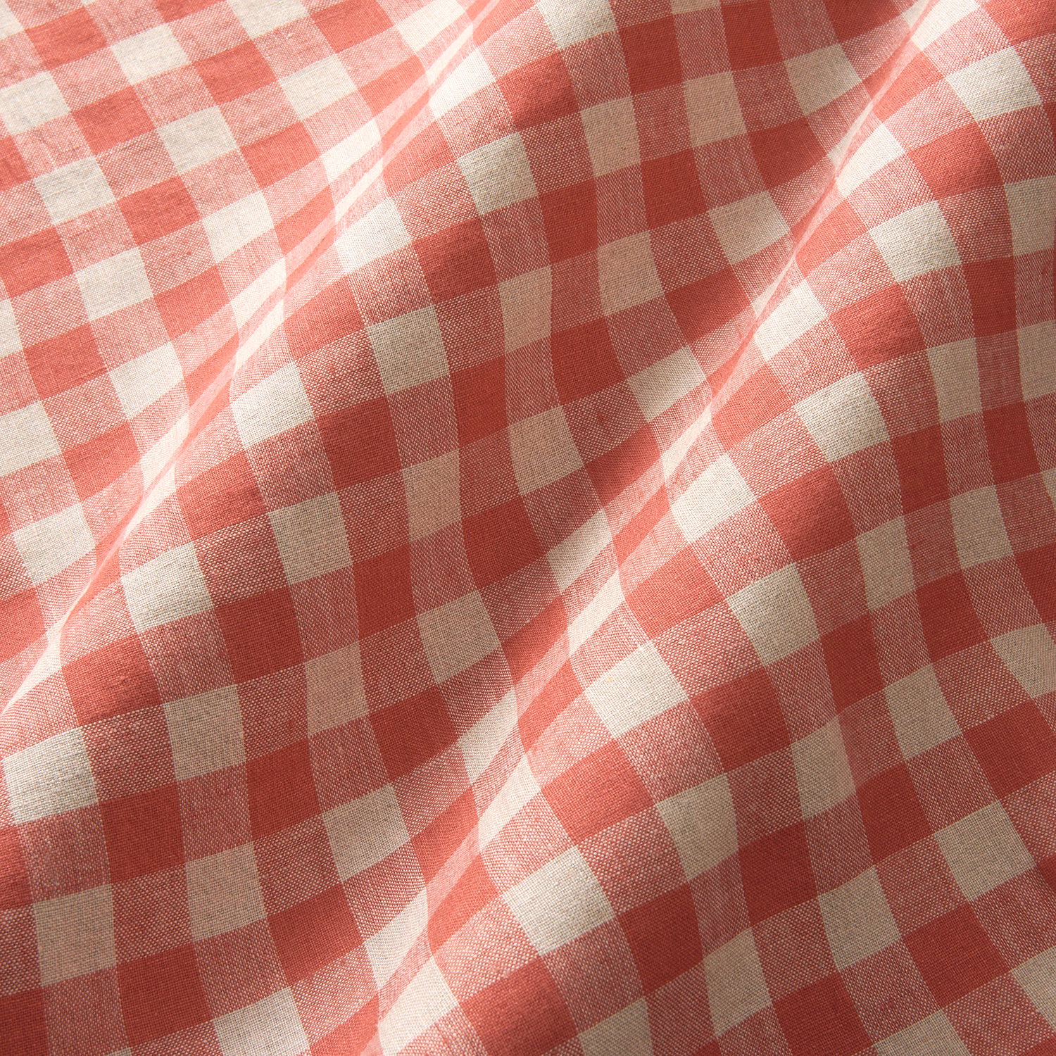 Cherry-red and ivory linen fabric with softly textured 4cm checks in folded light