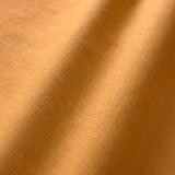 Burnt orange linen showing a fine plain weave and deep folded tonal shading