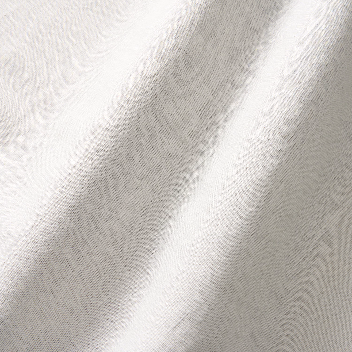 Pale cloud linen plain weave with cool grey shading and diagonal folds