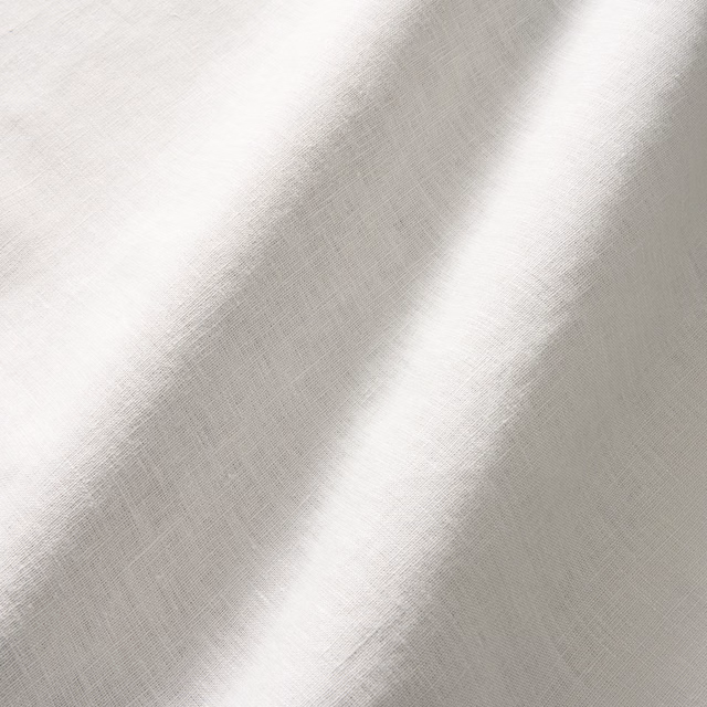 Pale cloud linen plain weave with cool grey shading and diagonal folds