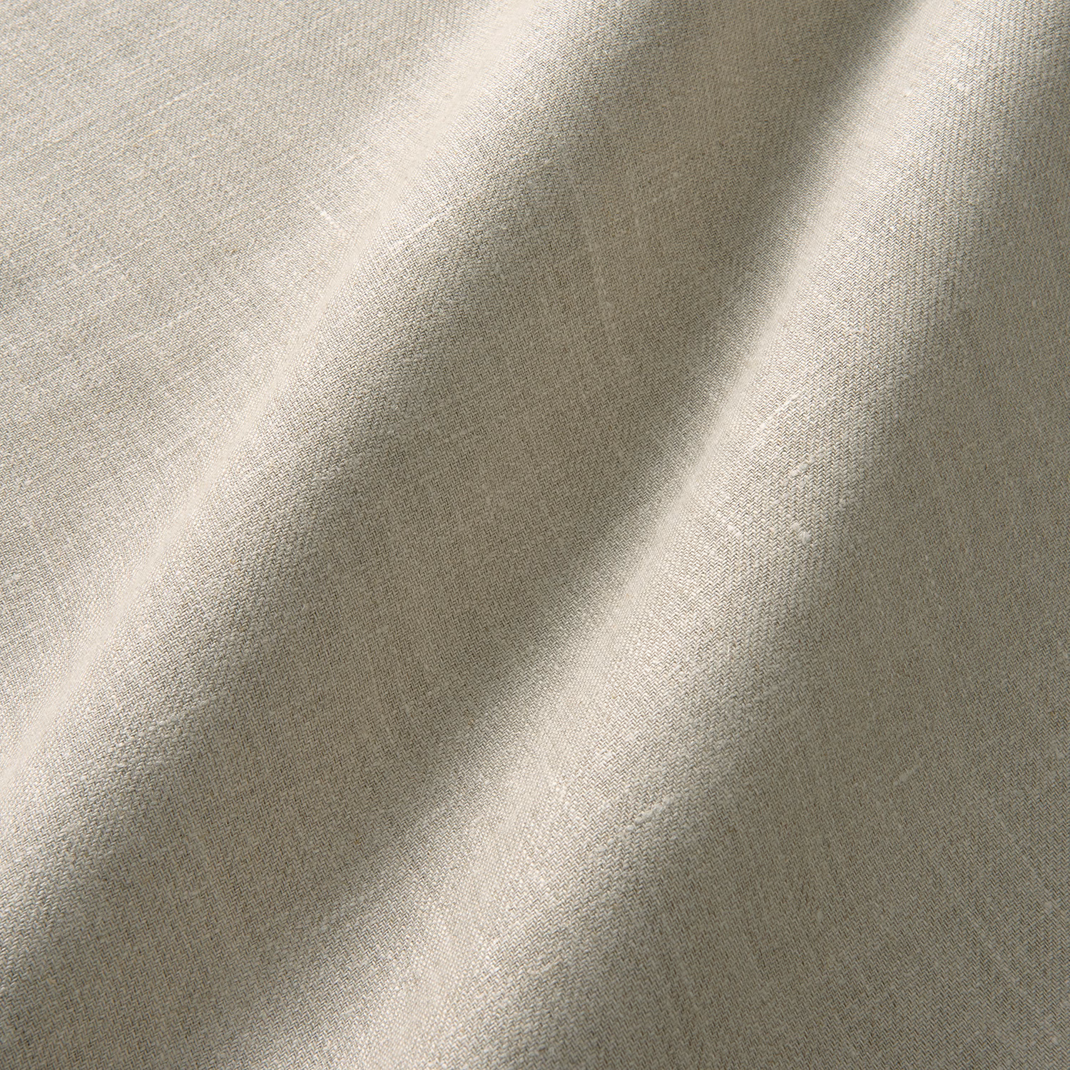 Pale natural greige linen curtain fabric with fine diagonal twill texture