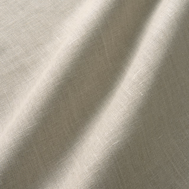 Pale natural greige linen curtain fabric with fine diagonal twill texture