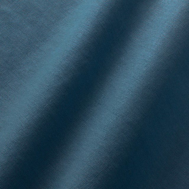 Deep teal-blue linen with a fine plain weave and softly shaded surface