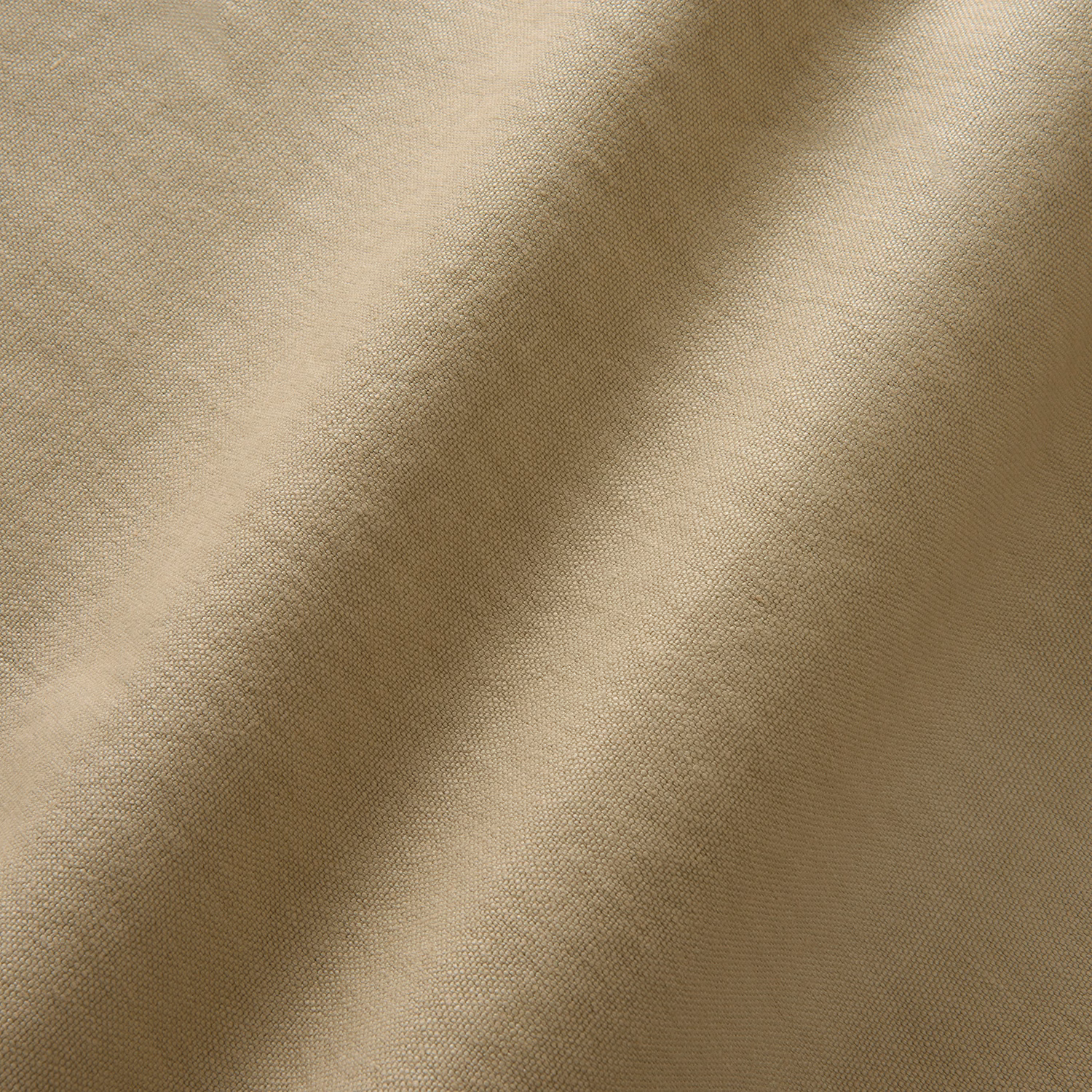Warm bisque linen with a fine plain weave and softly shaded folds