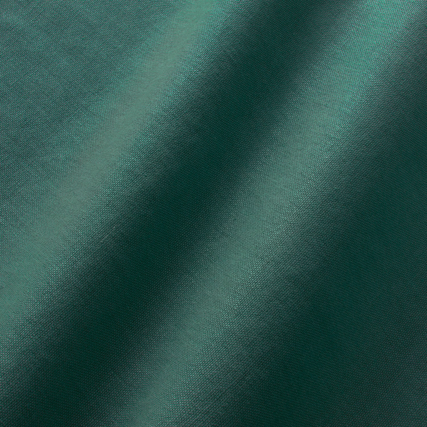 Deep forest-green plain linen with fine weave and diagonal fold shading