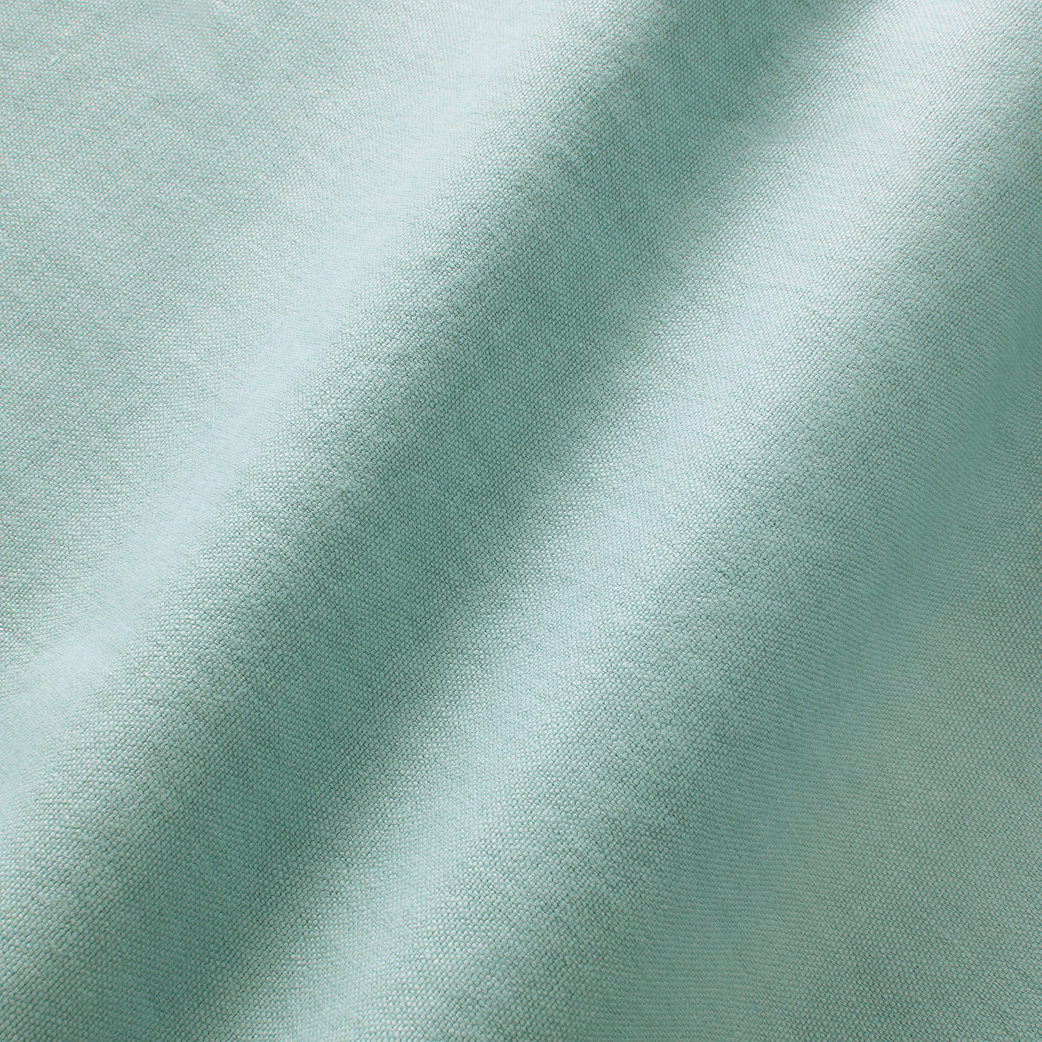 Pale ice-blue linen with a fine plain weave and softly shifting fold highlights