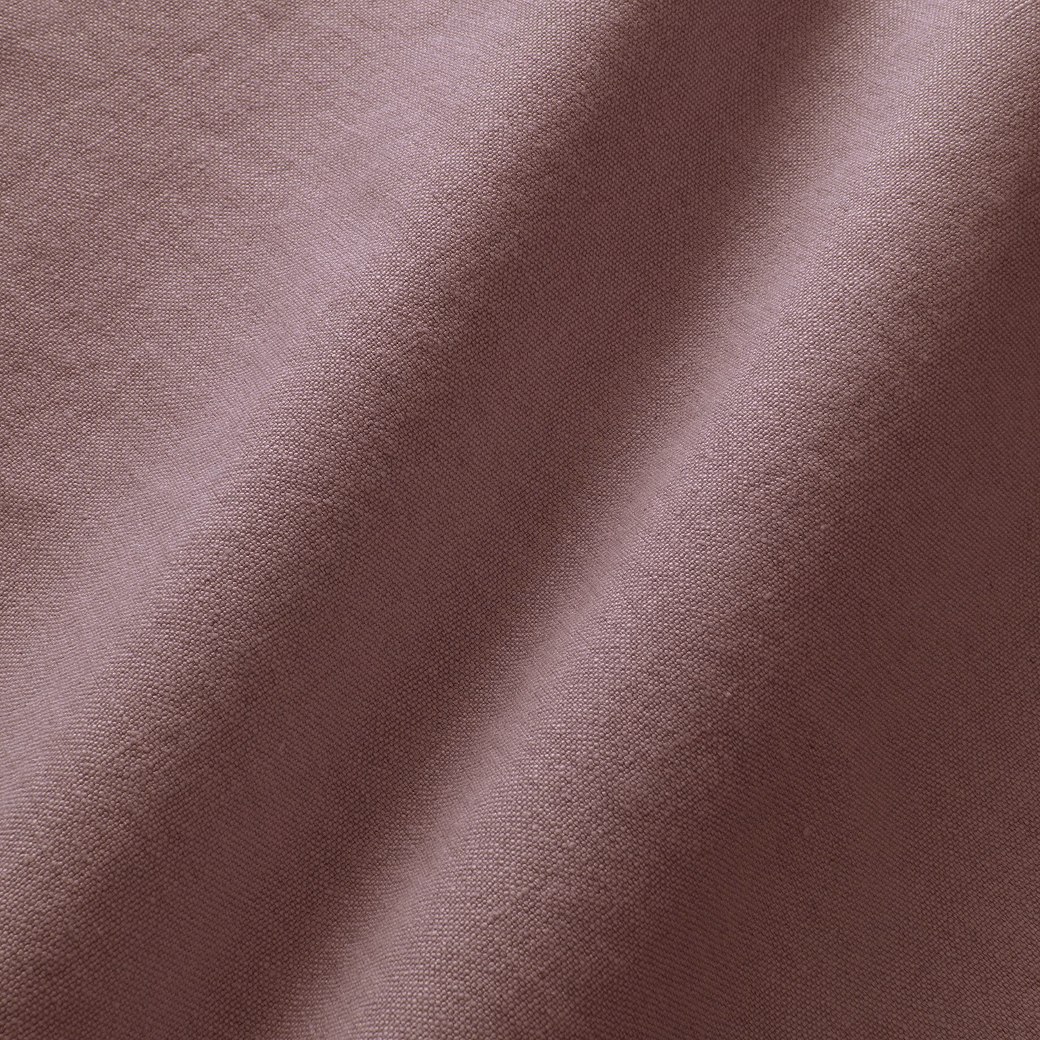 Dusky mauve-rose linen with fine plain weave and lilac fold highlights