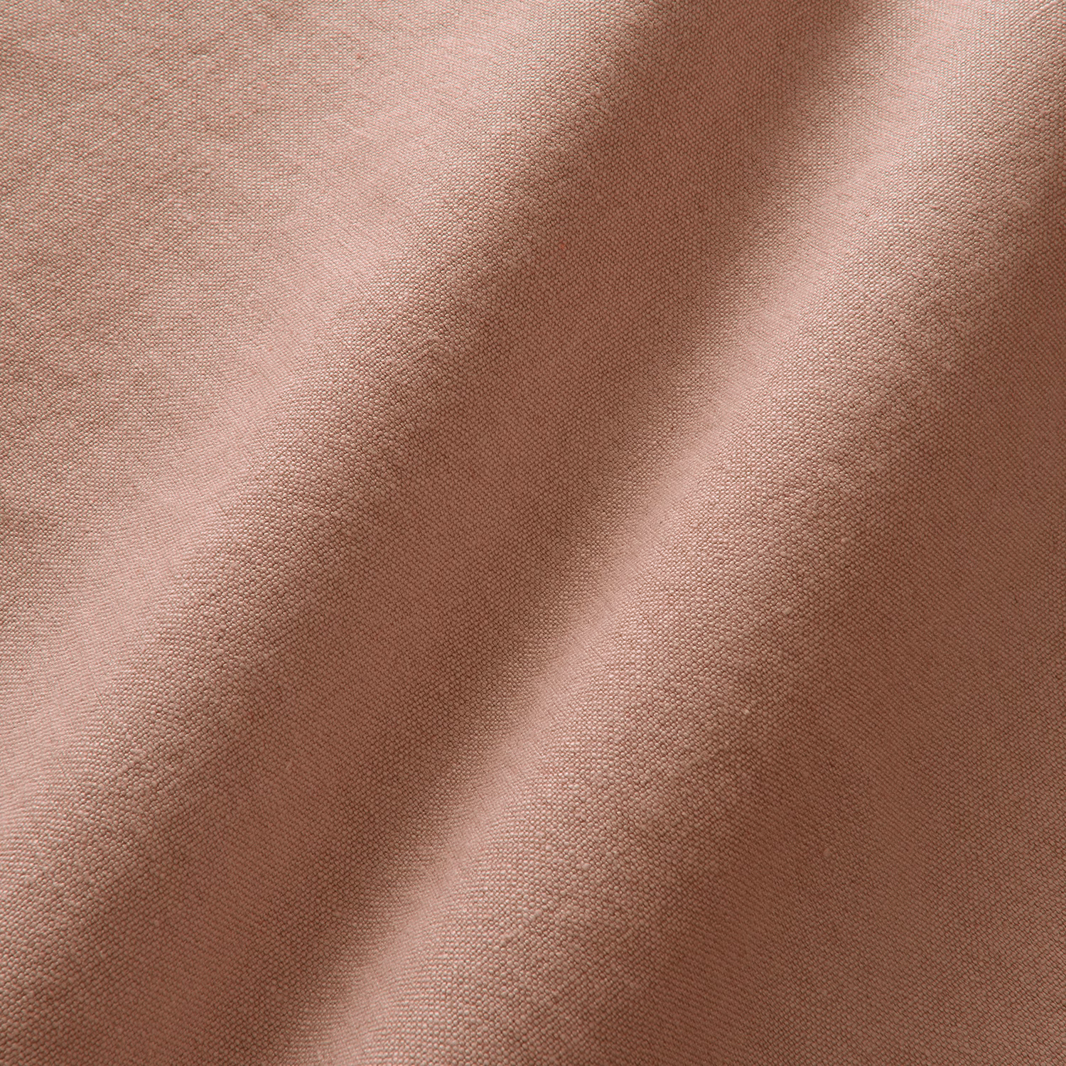 Muted dusty rose linen with fine plain weave and softly folded surface