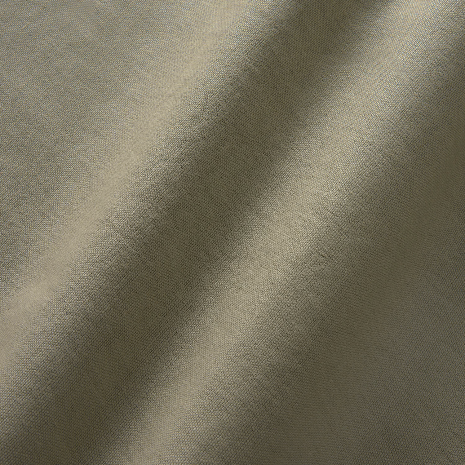 Close-up of muted sage-olive linen with a fine, softly tonal weave