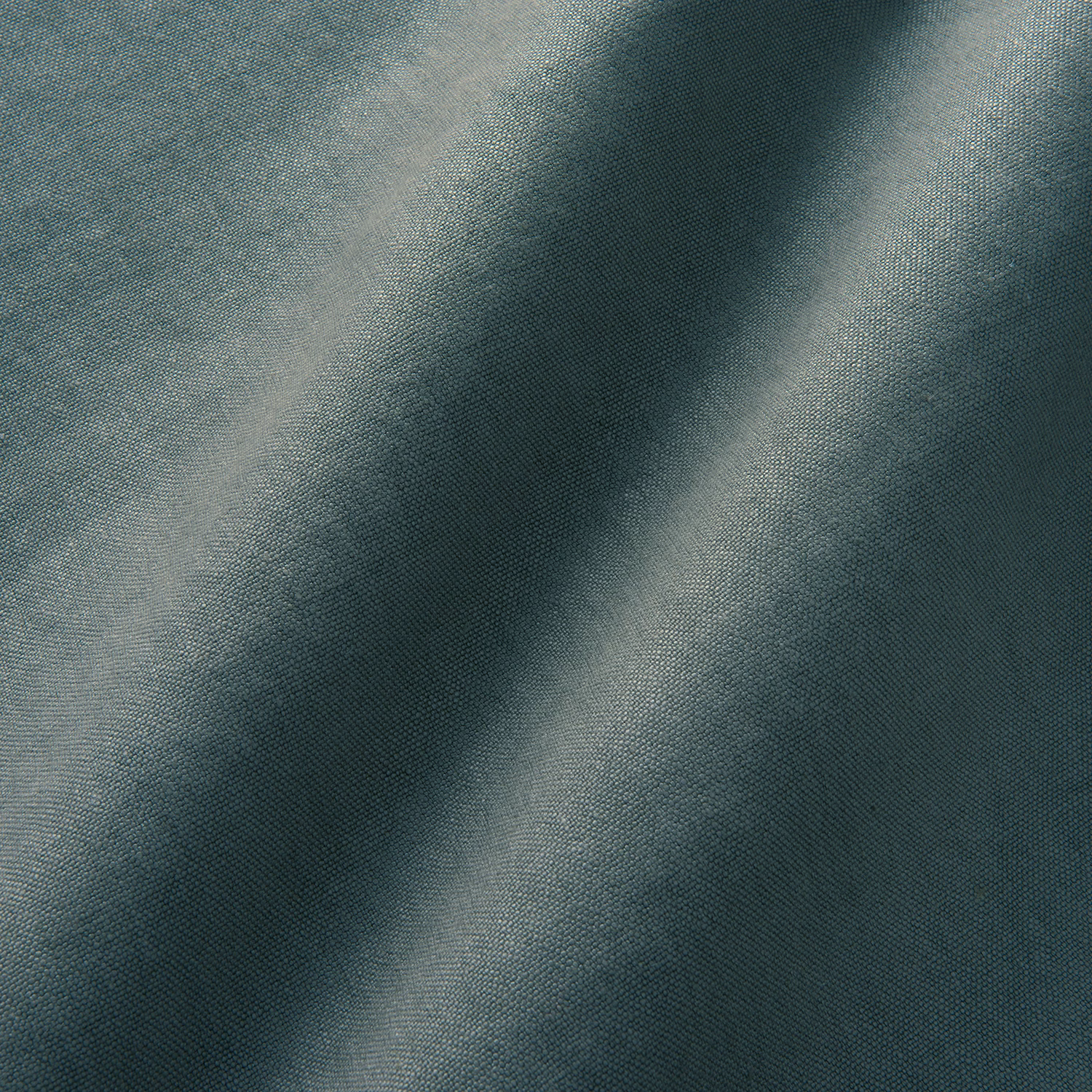 Cool slate blue-grey linen with fine weave and soft diagonal fold highlights