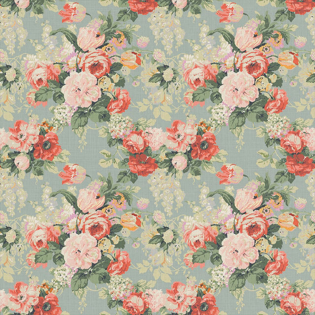 Cool blue-grey linen with coral roses, pink peonies and sage foliage
