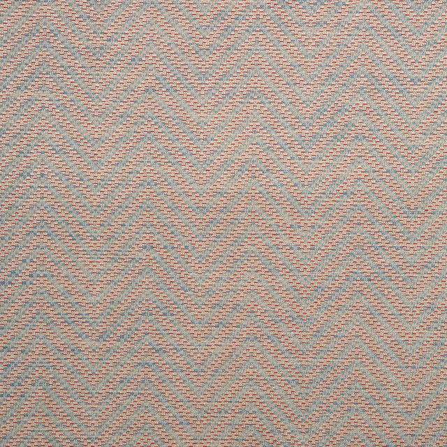 Muted aqua and coral chevrons woven across a warm beige ground