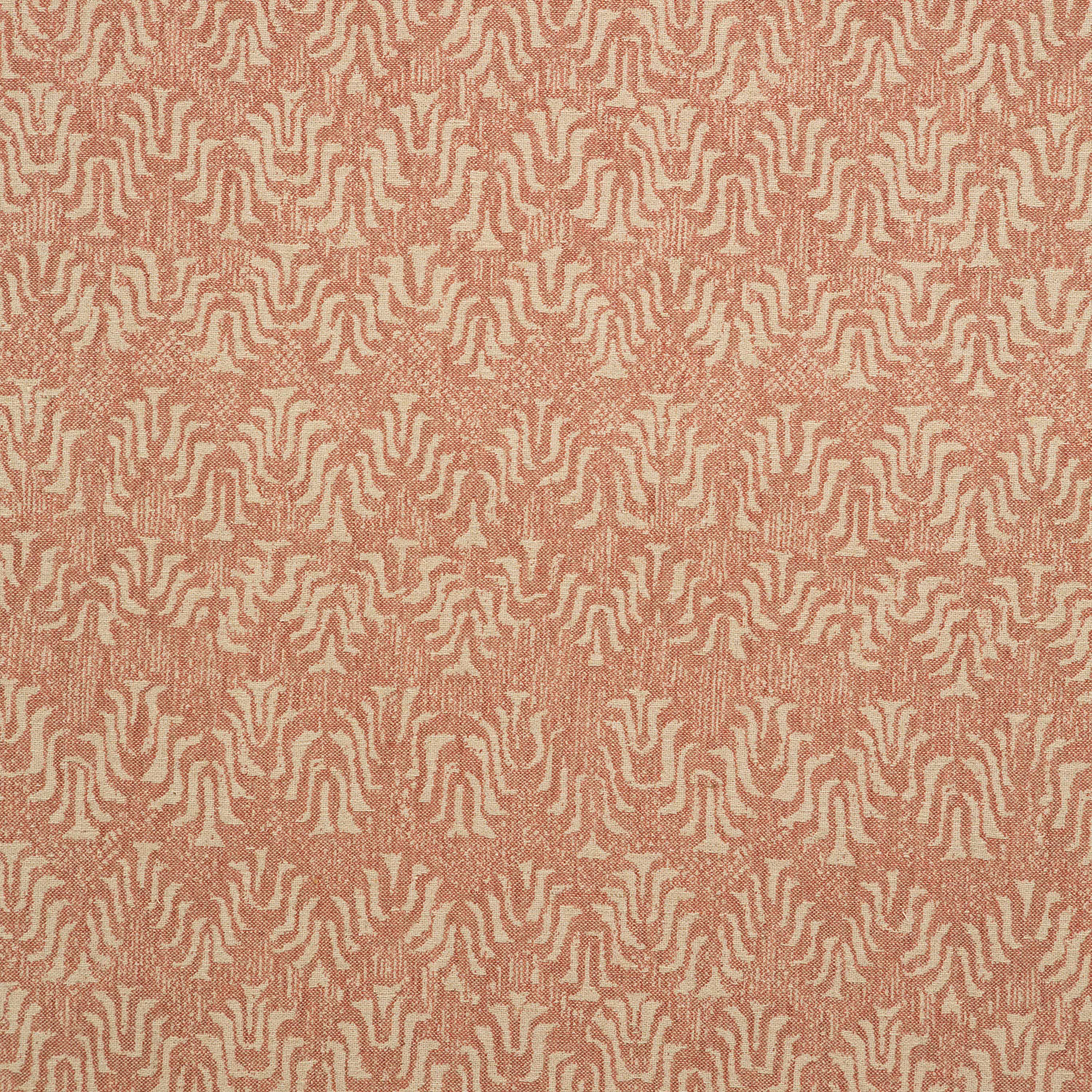 Warm blush woven ground with cream and terracotta maze-like organic motifs