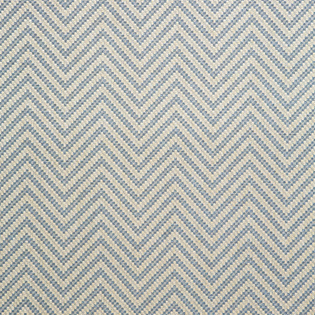 Cream and muted Delft-blue chevrons in a finely pebbled woven texture