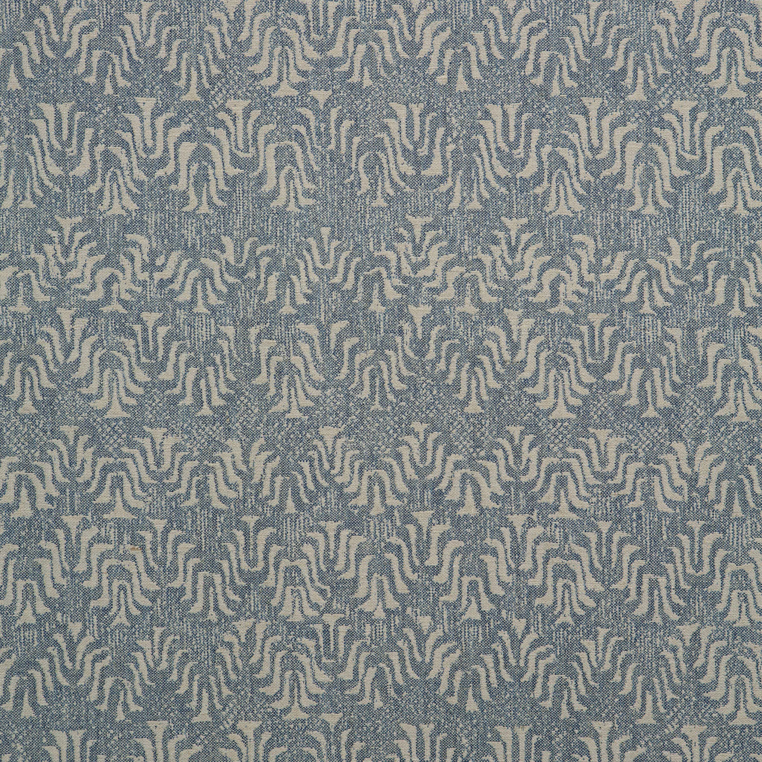 Blue-grey woven ground with pale beige branching motifs and granular texture