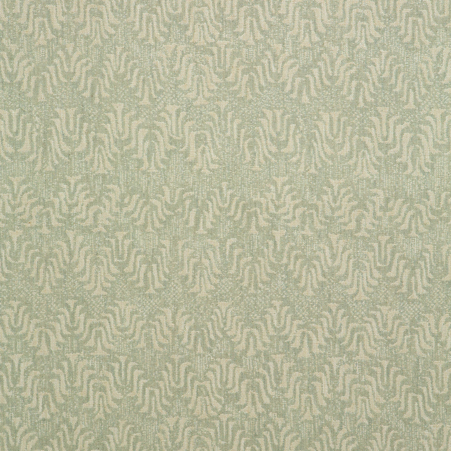 Pale sage woven fabric with softly raised, irregular ivory-green maze motifs