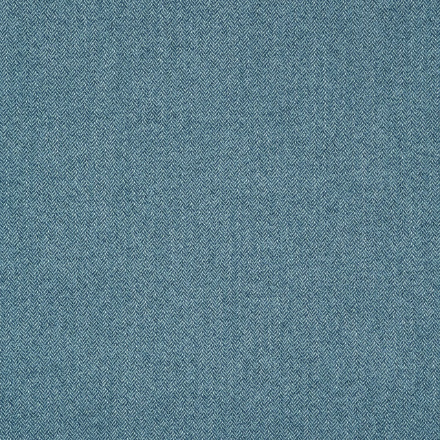 Close-up of muted mineral-blue herringbone weave with fine contrasting chevrons