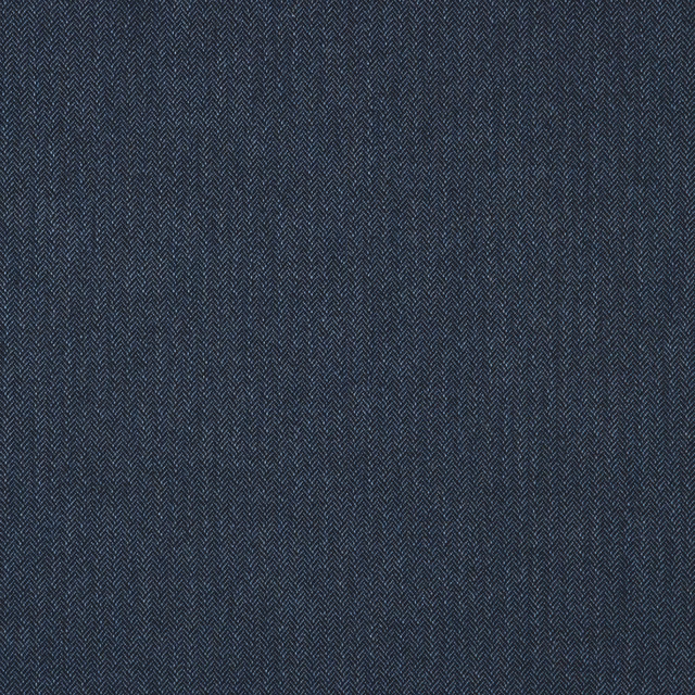 Close view of dark navy and blue-grey herringbone weave with fine texture