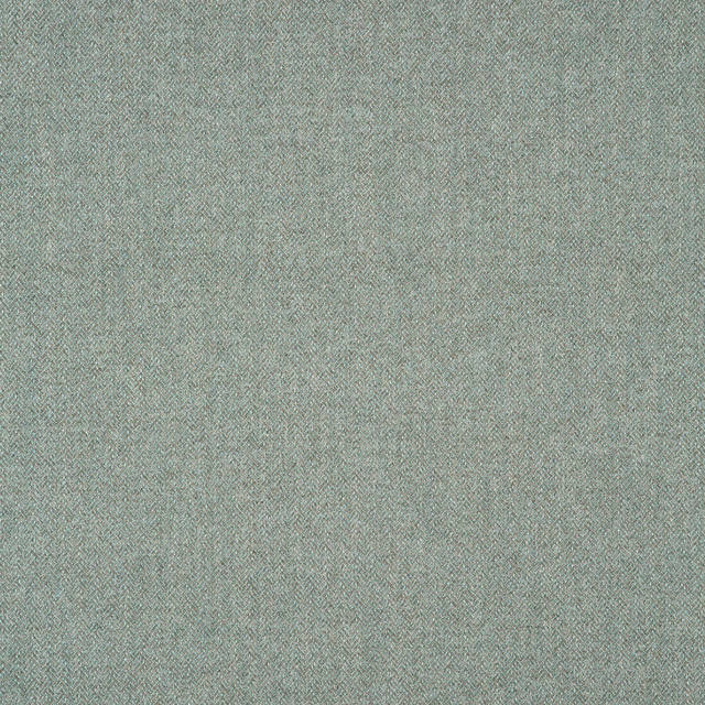 Muted blue-grey fabric showing a fine, softly mottled herringbone weave