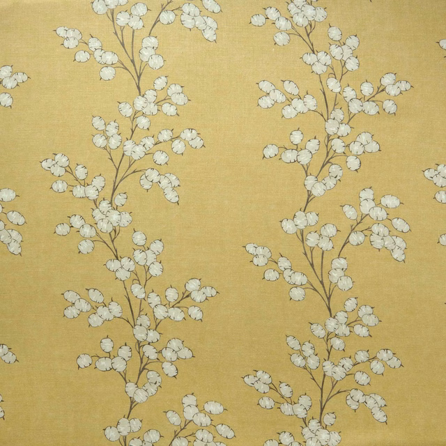 Mustard-yellow linen fabric with pale leaf sprigs and slender brown stems