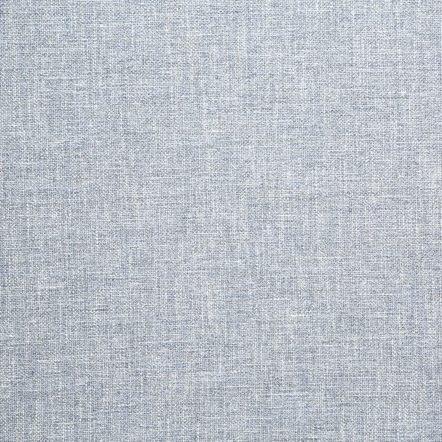 Pale periwinkle blue woven textile with fine crosshatch texture and lilac undertone