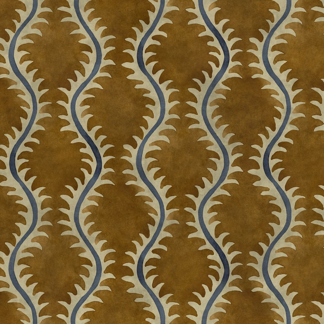 Turmeric ochre fabric with cream leafy ovals and winding blue-grey lines