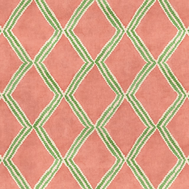 Coral pink geometric fabric with green diamond lattice weave