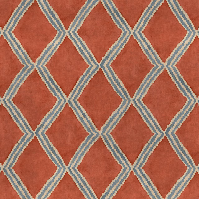 Terracotta geometric fabric with blue striped diamond lattice pattern