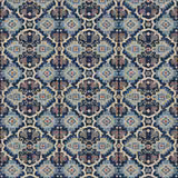 Navy geometric kilim fabric with lilac, pale blue, ochre and coral motifs