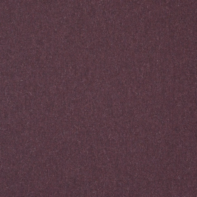 Deep muted plum-purple wool weave with subtle heathered flecks and tactile texture