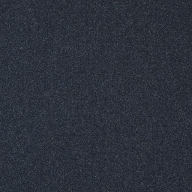 Dark cobalt-blue textile with a fine charcoal-mottled weave and soft grain