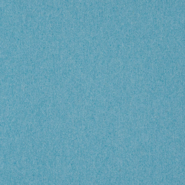 Close-up of softly mottled cyan-blue wool-blend weave with a quiet, even texture