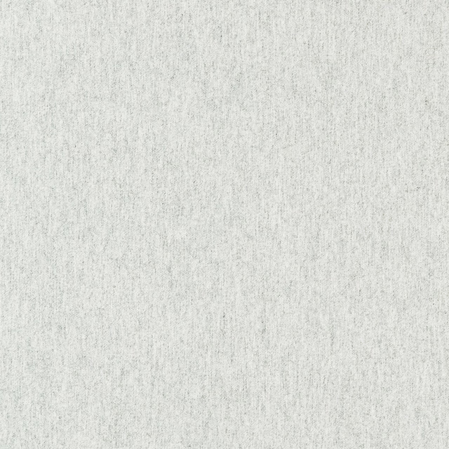 Close-up of pale frosted white woven fabric with fine vertical grey slubs