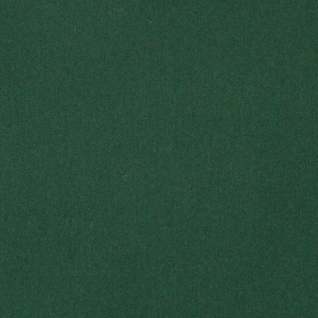 Deep hunter green plain woven fabric with subtle woolly tonal texture