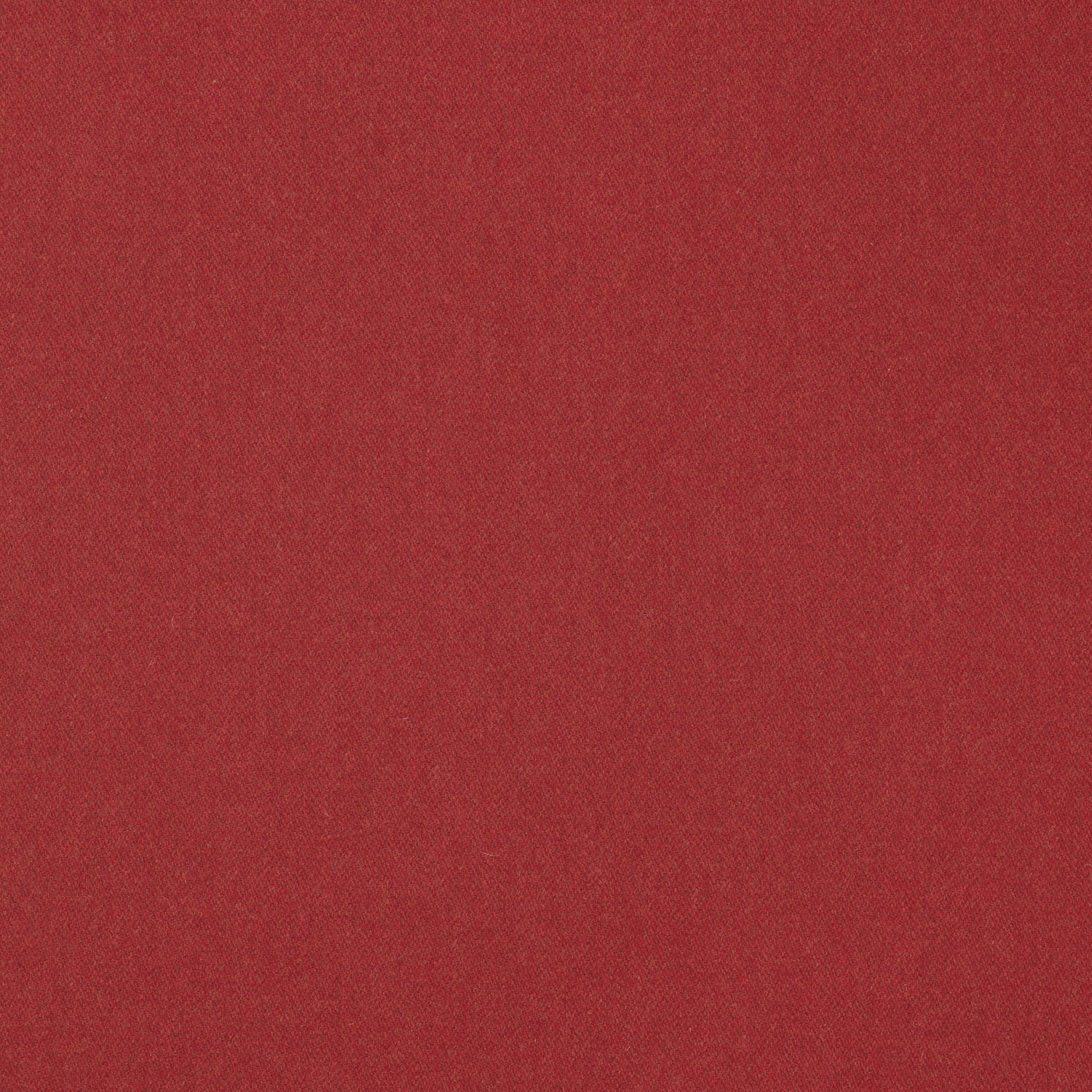 Close-up of deep raspberry red plain wool-blend weave with subtle tonal texture