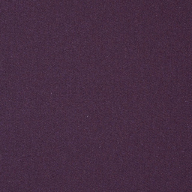 Deep magenta-plum plain weave with subtle woolly texture and low sheen