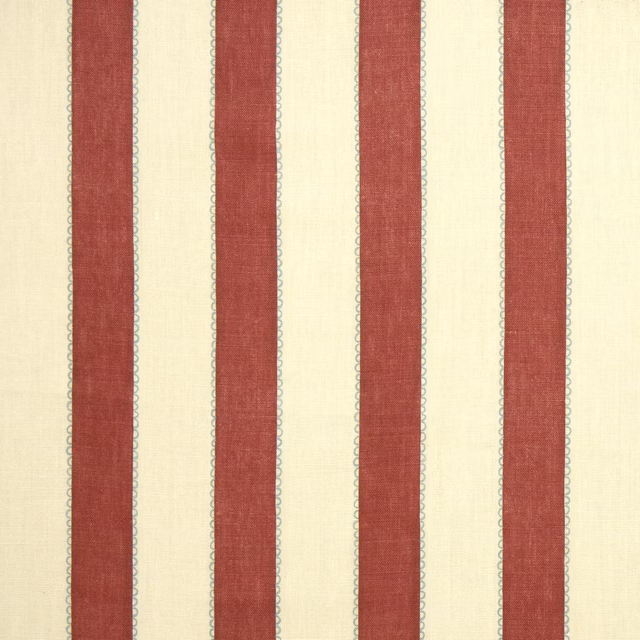 Cream linen fabric with wide muted red vertical stripes and thin scalloped blue-grey edging